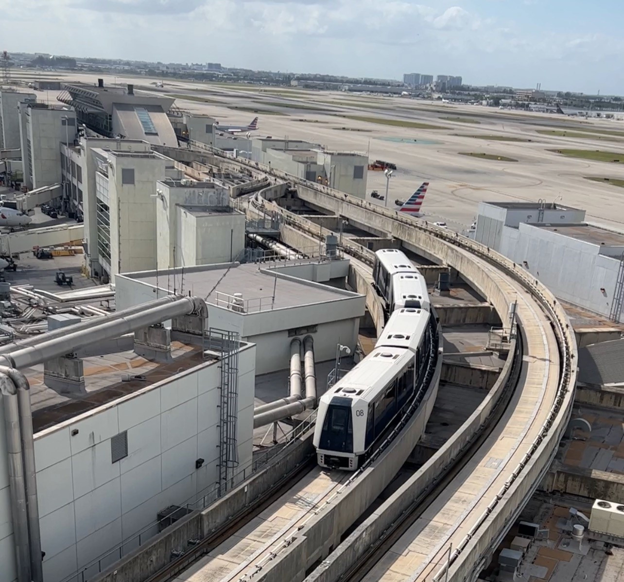 Aerial view of Miami International Airport with the Skytrain